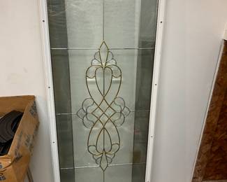 Brand new never used stain glass style insert for an exterior front door.