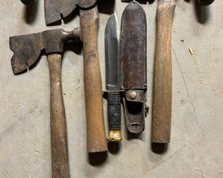 MARBLES Hunting Knife w/ sheath, various hatchets and on top a draw knife.