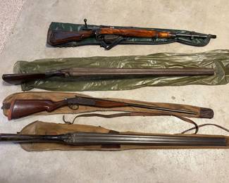 top is (I believe)??? is a Polish rifle made for the Japanese soldier??? markings show 1145 or H45    F2128          (303 ammo)???                                                                                   
12 ga double barrel AGUHE Arms Co. (left hammer & firing pin is missing) has a Damascus barrel.                                                                                              410 Irv Johnson single shot                                                               12 ga Tipping & Lawden with a self locking vertical grip                           