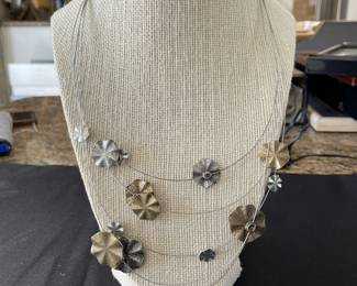 SILVER TONE MULTISTRAND FLORAL STYLE NECKLACE