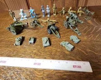 Vintage cast iron soldiers guns and tanks