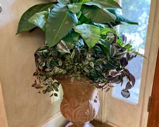 Lots of pots and faux plants, indoor and outdoor