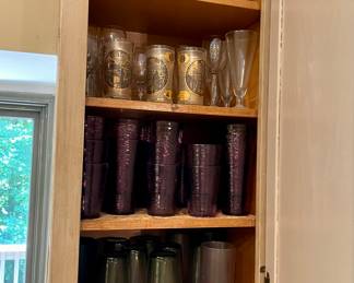 Kitchen filled with cookare and glassware