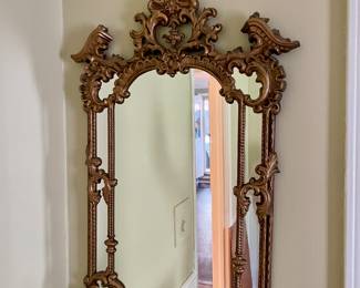 Beautiful ornately curved hall mirror