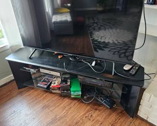 TV, DVD/CD Player, VCR Player and entertainment stand