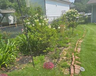 Bird feeders and Shephard hook.