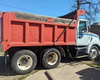 1993 Volvo Dump Truck, VIN 4V1JDBRE8RR824874, Eaton 10 Speed, Chelsea Hydraulic Hoist, 60 Series Detroit Motor, Warren Steel Bed, Model Number FL651–12, Rated Capacity 10/12 Yards, Steel Rims 11 R 24.5Tires, Wood Extensions On Top