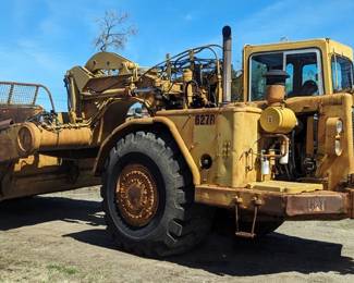 Caterpillar CAT 627B Dual Engine Scraper, Serial Number 15S791, 14,489 Hours On Gauge, Cushion Hitch, Hook And Bail System, 29.5–29 Tires, Forced Ejection, 10' Cut, 14 Yard Struck, 20 Yard Heap Capacity, AC And Heat In Cab, Powers On, Dual 3306, Car Diesels