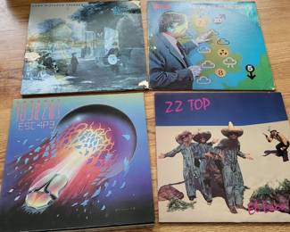 lots of classic rock vinyls including the doors, zz top, ac/dc , and more