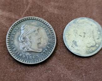 us bust half dime from 1836 and civil war token .