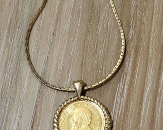 1/10 oz gold kruegerand coin pendant  with 22kt and 14kt chain.