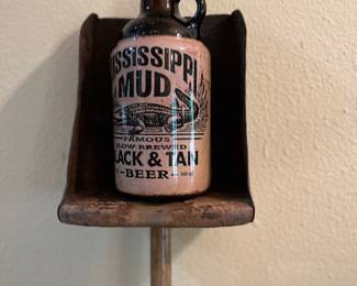 Mississippi Mud beer bottle
Shelved on a feed scoop
