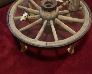 Would you look at this? It’s a coffee table made from a wagon wheel that was used on family farm.
$175