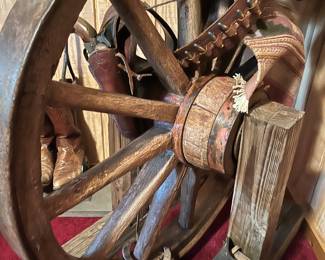 Spinning Wagon Wheel on frame
$200
