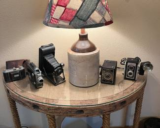 Wall table $38
Vintage cameras 