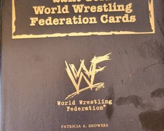Approximately 50 Danbury Mint WWE CARDS in binder $50