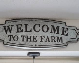 Metal Welcome sign.