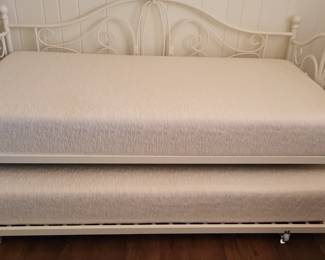 Trundle bed with memory foam mattresses.
