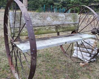 Old wagon wheel bench.