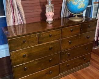 Chest of Drawers, world globe, vintage lamp