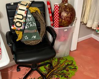 Black office chair, quilt decor piece, sign, & paper