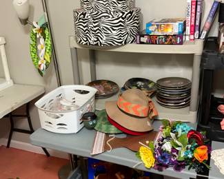 Signs & pictures in bin on floor, hats, vintage plates, hat boxes, books, & miscellaneous 