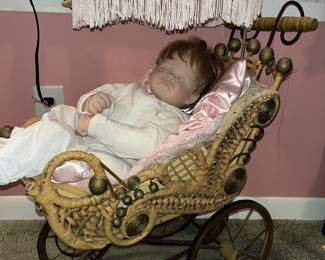 Beautiful doll carriage and a sleeping baby!