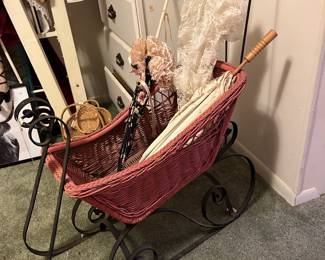 Small sleigh with some vintage umbrellas