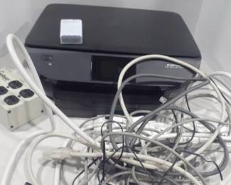 Hewlett Packard printer,, scanner,, copier snd photo printer. With no power cord but extra cords