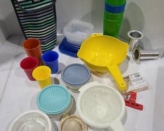 Tupperware colander, storage bowls, tumblers, insulated lunch/bottle bag, plastic juicers, more
