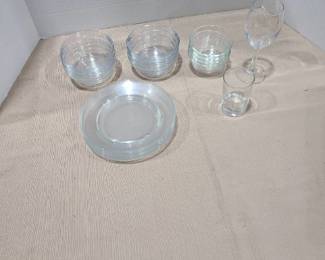 Six glass salad plates, 6 small bowls. 4 Pyrex custard cups, wine and juice glasses