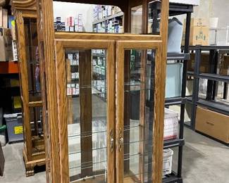 Carved top oak and glass curio cabinet 78 x 38 x 14 in (glass needs seal put back correctly)
