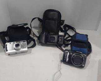 Cameras with bags. Canon Sure Shot Z180u. Fuji 35mm and another Canon Power Shot SX120lS
