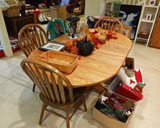 Oak dining table and four chairs