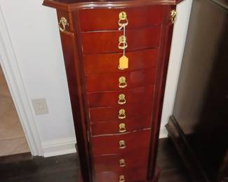 Jewelry cabinet storage on sides as well
