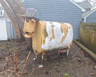 Large Artist made cow for yard or garden.