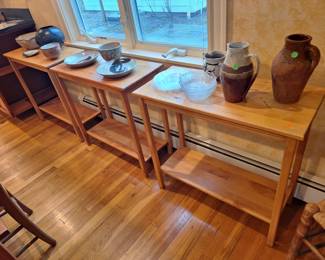 Three matching tables and art pottery