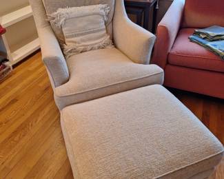 Lovely cream colored chair and ottoman