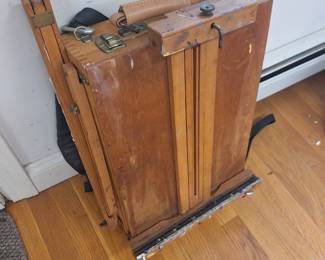 Artists portable traveling studio stand and easel.  Great for Plein air painting. 