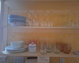 Plain white plates and bowls lots of glassware