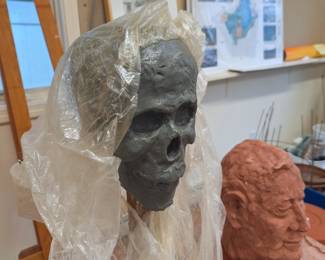 Closeup of head sculptures