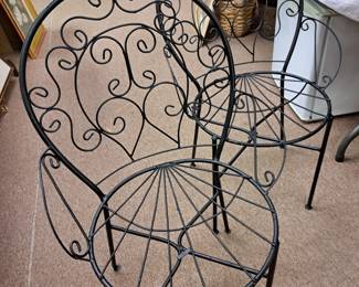 Vintage pair metal patio chairs