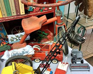 Vintage estate children's items. "Tonka Dragline", "Tiny Tonka Scorcher ", Structo Fire Dept.", MTD tricycle, Hubley Jeep and Ertl " Gleener Allis Chalmers"
Chalmers
