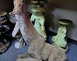 Much concrete statuary.  Vintage concrete  giraffe and concrete fish bases