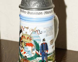 There are several steins available for sale; two of them are vintage lithopanes