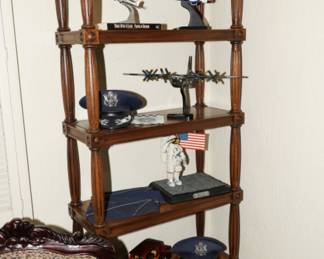 There are two beautiful bookcases available as well as several di-cast, wood, & scale model airplanes.