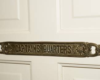 Vintage brass Captain's Quarters door sign.