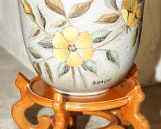 Mid Century Alvino Bagni floral vase on light wood pedestal base, sold separately.