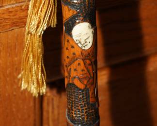 Inlaid mother of pearl Asian figural carved wood cane