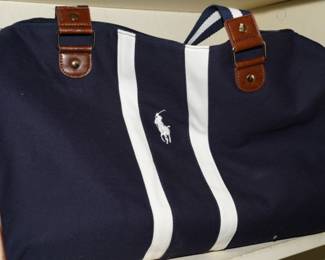 There are several pieces of Polo Ralph Lauren luggage available.